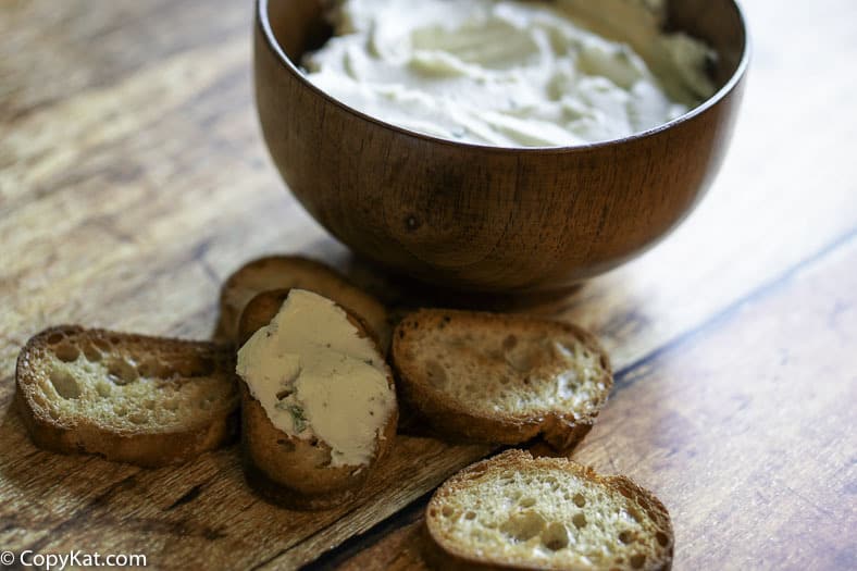 Make this creamy Mozzarella's Bread Spread, it combines cream cheese, butter, garlic, and herbs. 