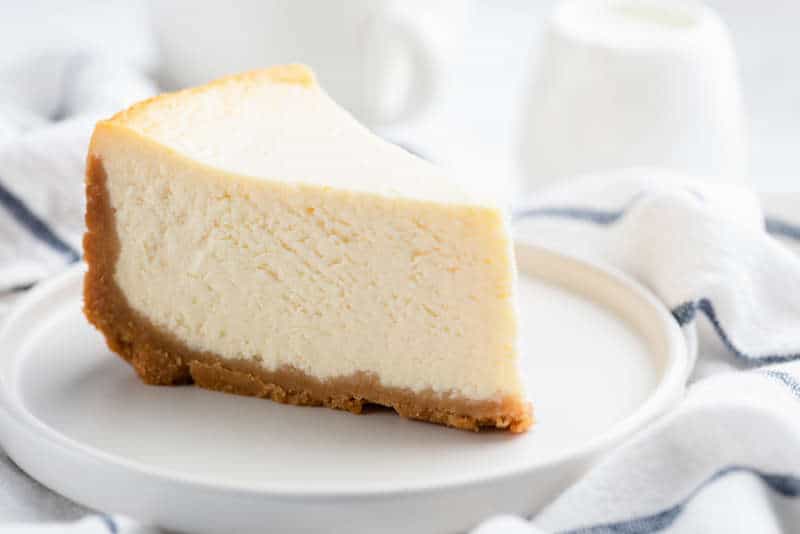 cheesecake slice on a white plate