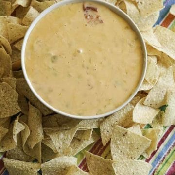 homemade queso made with green chilies, onions, and garlic