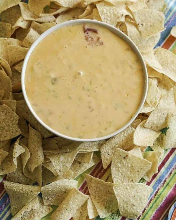 homemade queso made with green chilies, onions, and garlic