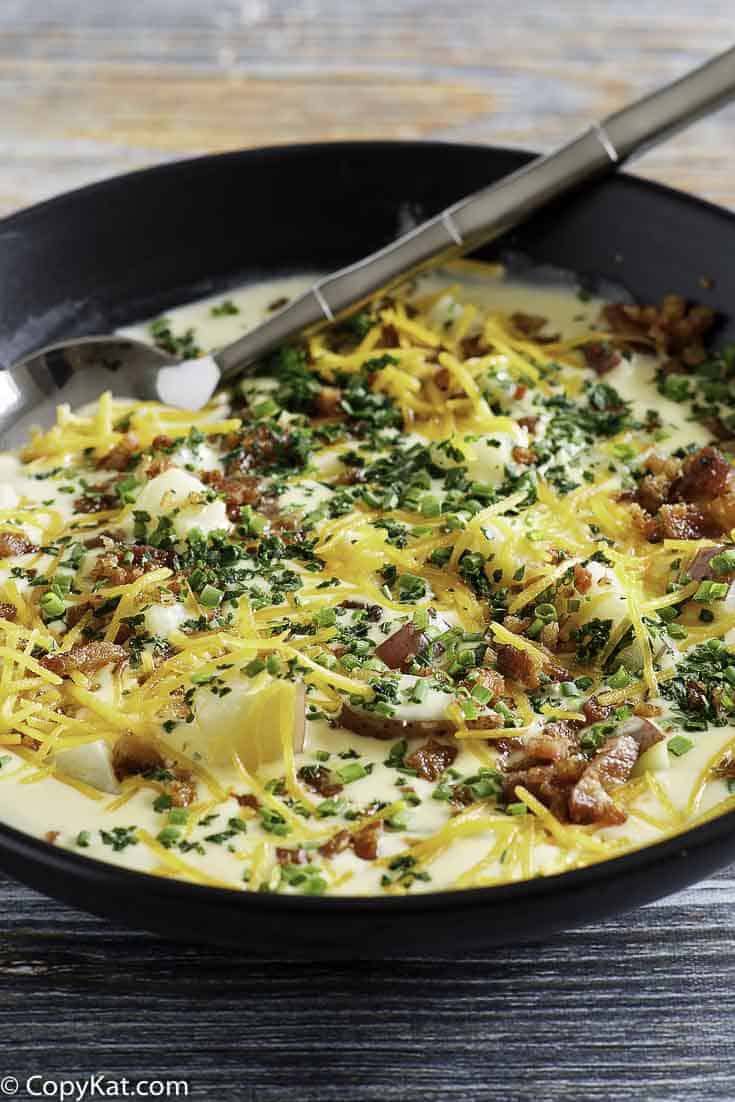 A bowl of copycat O'Charley's Baked Potato Soup