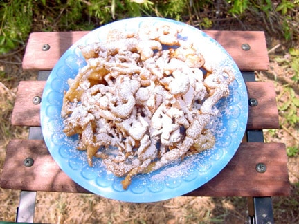 County fair funnel cakes – you can make funnel cakes just like you buy out.