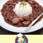 a bowl of red beans and rice with sausage