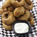 You can make Simon and Seaforts Beer Battered Onion Rings at home with this easy copycat recipe.