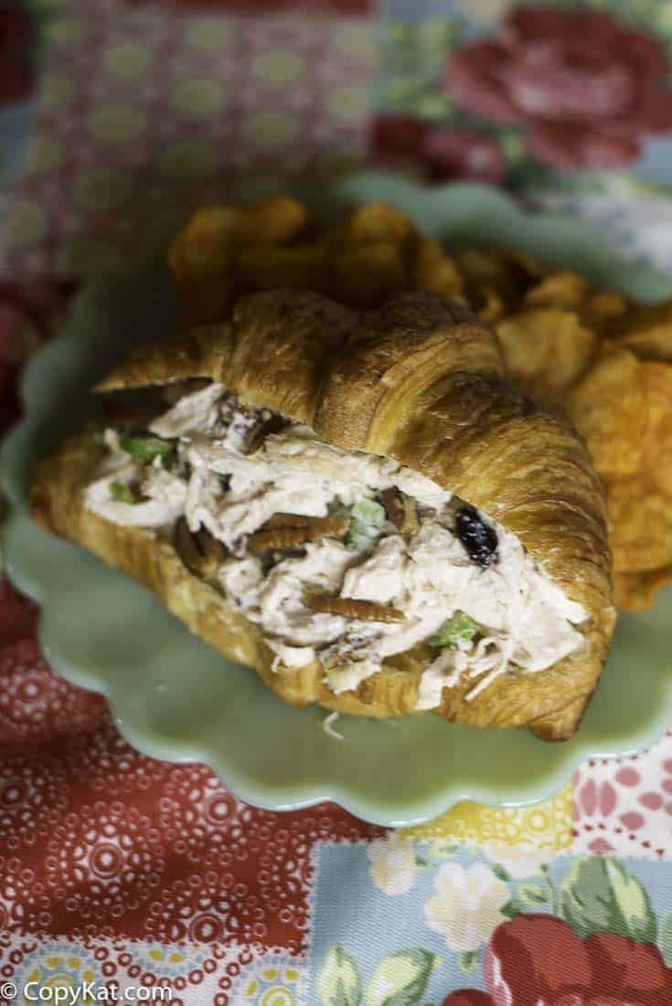 Chicken salad with dried fruit in a croissant. 