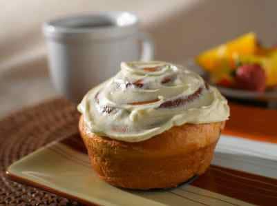 cinnamon roll covered with icing