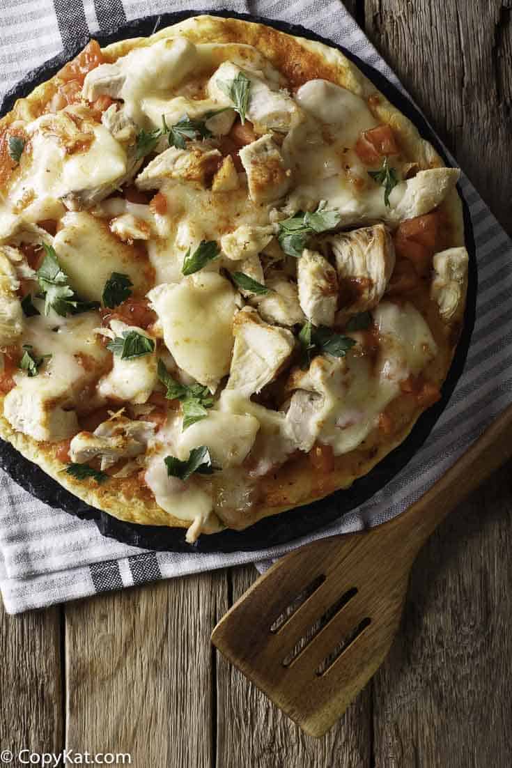 buffalo chicken pizza on a serving plate
