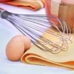 Egg Whisk and Brown Eggs