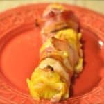 cheese and bacon log on a plate