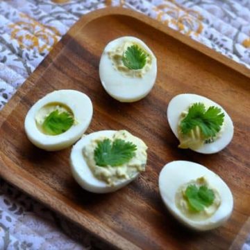 deviled eggs with jalapeno pepper and lime and cilantro