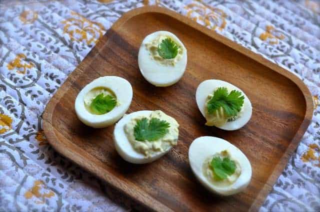 deviled eggs with jalapeno pepper and lime and cilantro