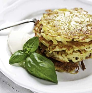 a stack of potato pancakes on a plate