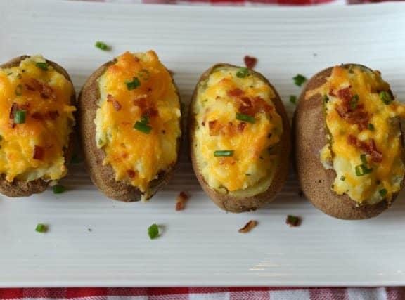 twice baked potatoes on a white plate
