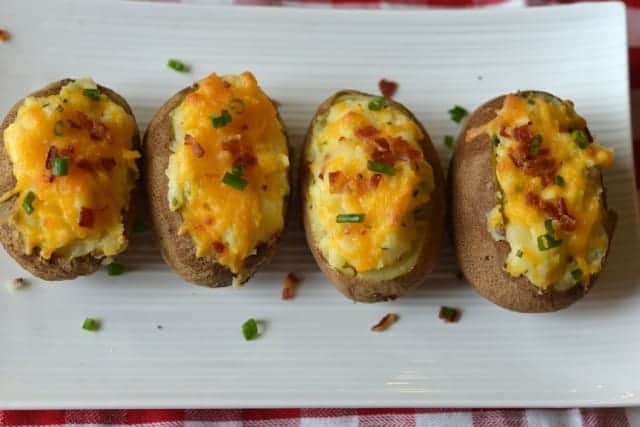 twice baked potatoes on a white plate