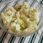 mashed potatoes with butter, cream, and green onions