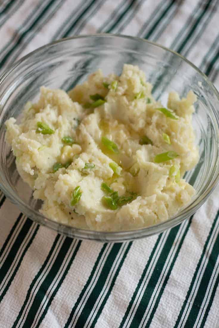 mashed potatoes with butter, cream, and green onions 