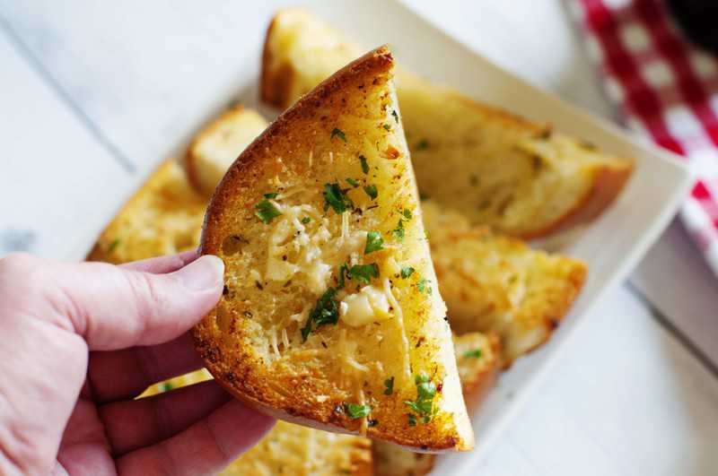 homemade crispy garlic bread with parmesan cheese