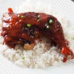 Try this Sriracha Honey Glazed Chicken Leg Quarters tonight. This is an easy weeknight recipe to make.