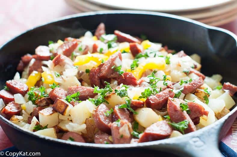 Make this easy to prepare hash with smoked sausage. This skillet can be put together quickly.