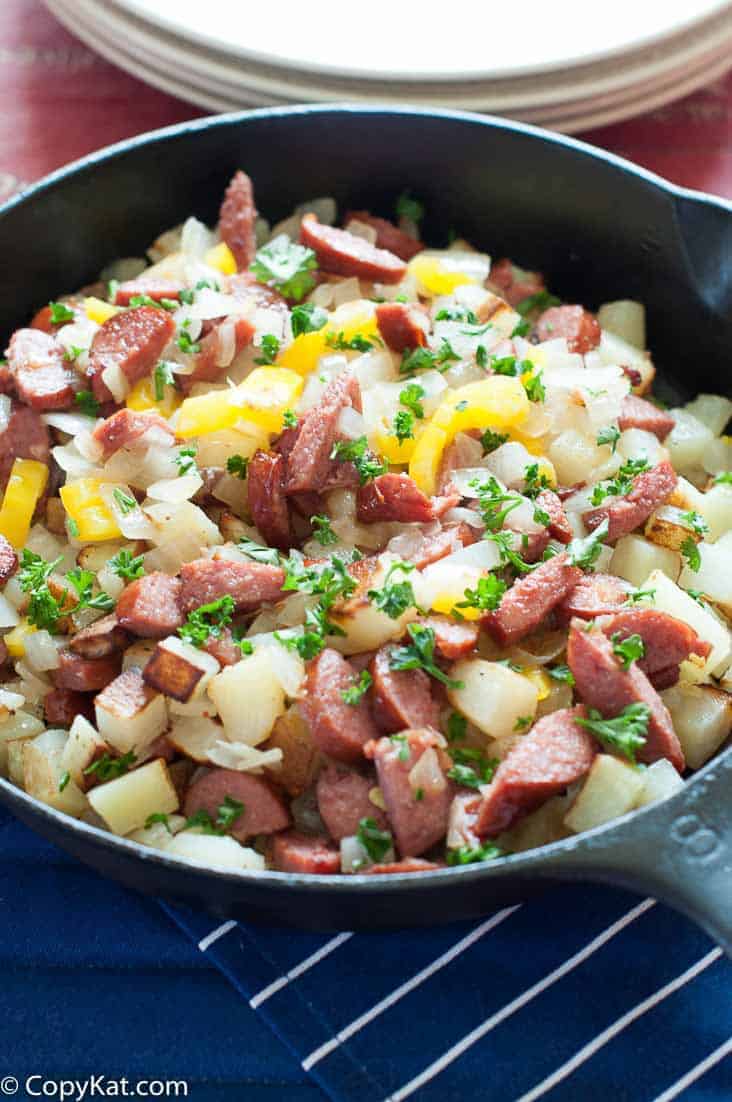 Make a tasty skillet supper with smoked sausage and fresh vegetables.