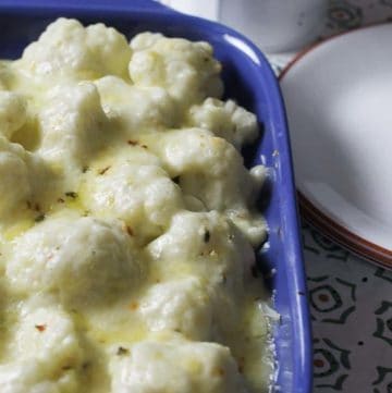 Baked pepper jack cauliflower gratin in a baking dish.