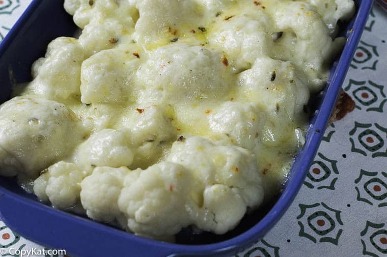 Pepper Jack Cauliflower Gratin in a blue casserole dish.