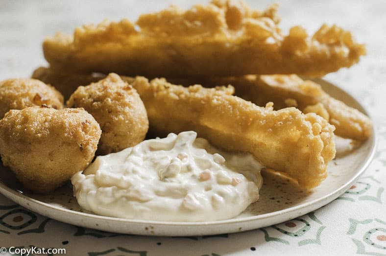 Homemade Red Lobster Tartar sauce and fish stick on a plate.