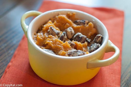 A bowl of homemade Red Lobster Whipped Sweet Potatoes with Honey Roasted Pecans