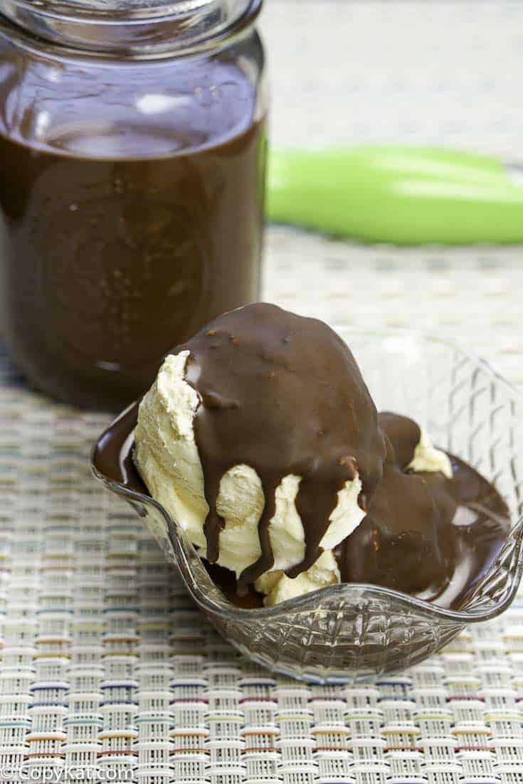 A dish of vanilla ice cream with homemade magic shell topping