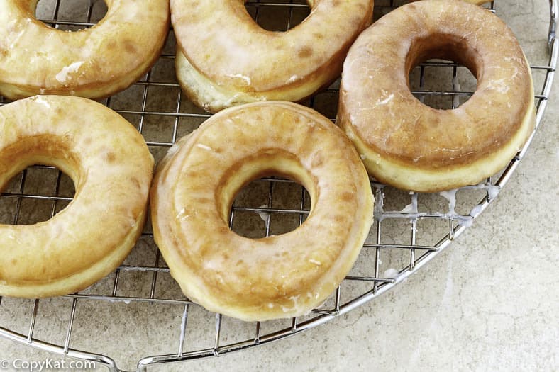 glazed donuts on a wire baking rack