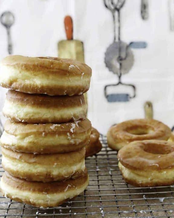 a stack of homemade Krispy Kreme Glazed Donuts