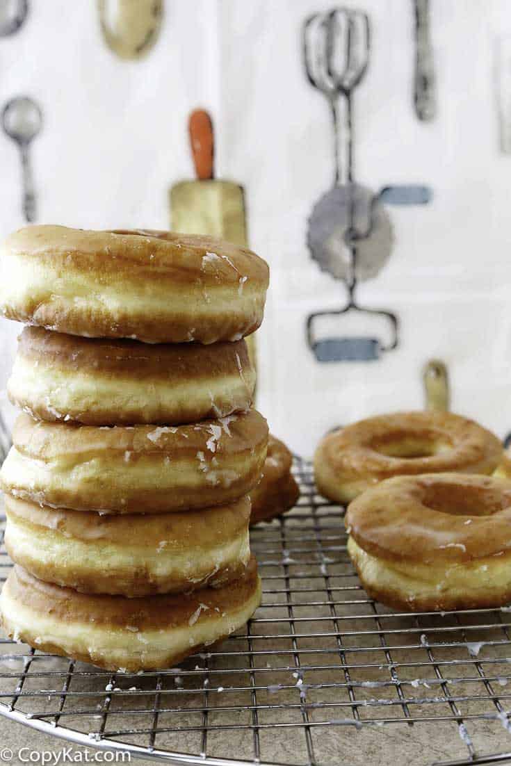 a stack of glazed donuts