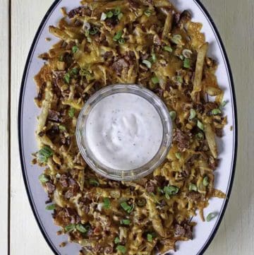 Homemade Cheddar's Texas Cheese Fries with ranch dip