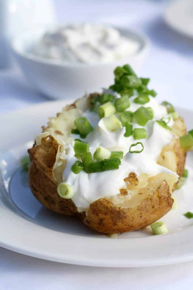 Make baked potatoes in a slow cooker, it's so easy to do. 