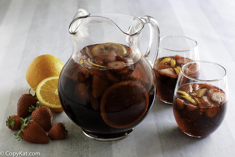 sangria in a pitcher and two glasses