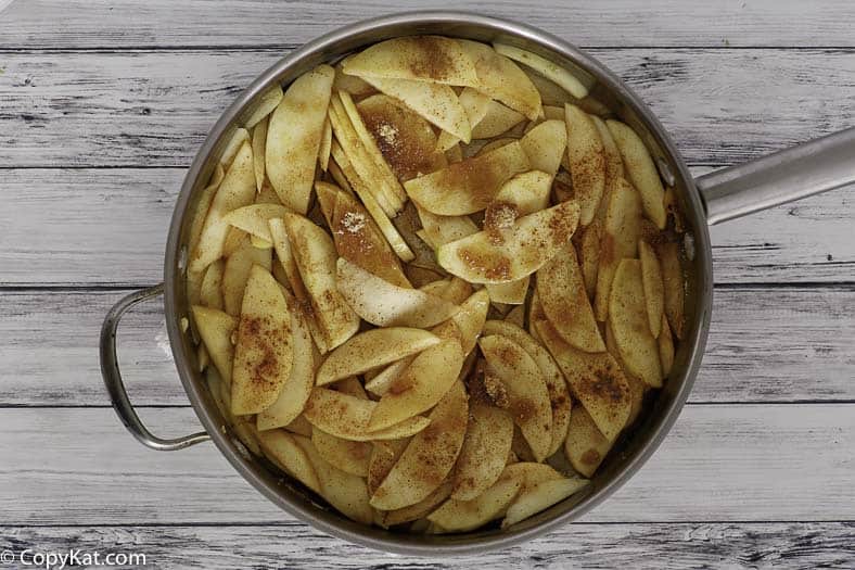 Homemade Cracker Barrel fried apples in a skillet.