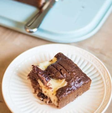 Enjoy this Earthquake cake, it's the perfect combination of German Chocolate Cake and Cheese cake filling. #chocolate #cheesecake #cake #cakemix