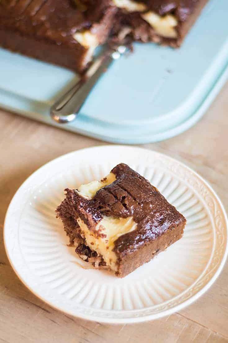 Enjoy this Earthquake cake, it's the perfect combination of German Chocolate Cake and Cheesecake filling.   #chocolate #cheesecake #cake #cakemix