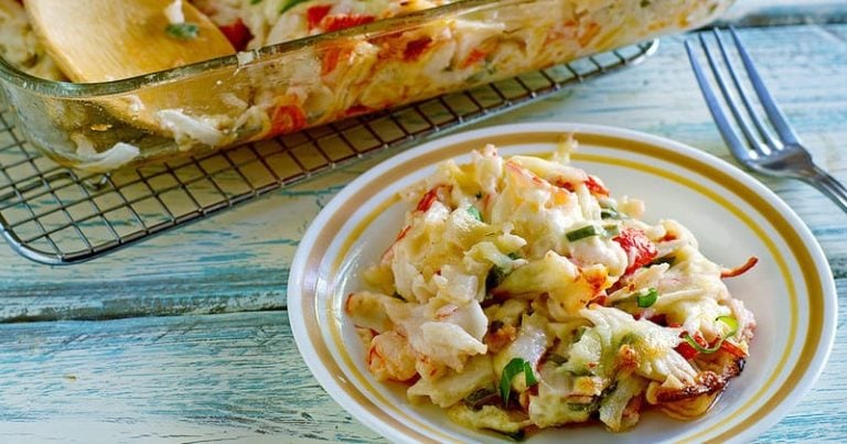 Homemade copycat Chinese Buffet Seafood delight bake crab casserole on a white plate.
