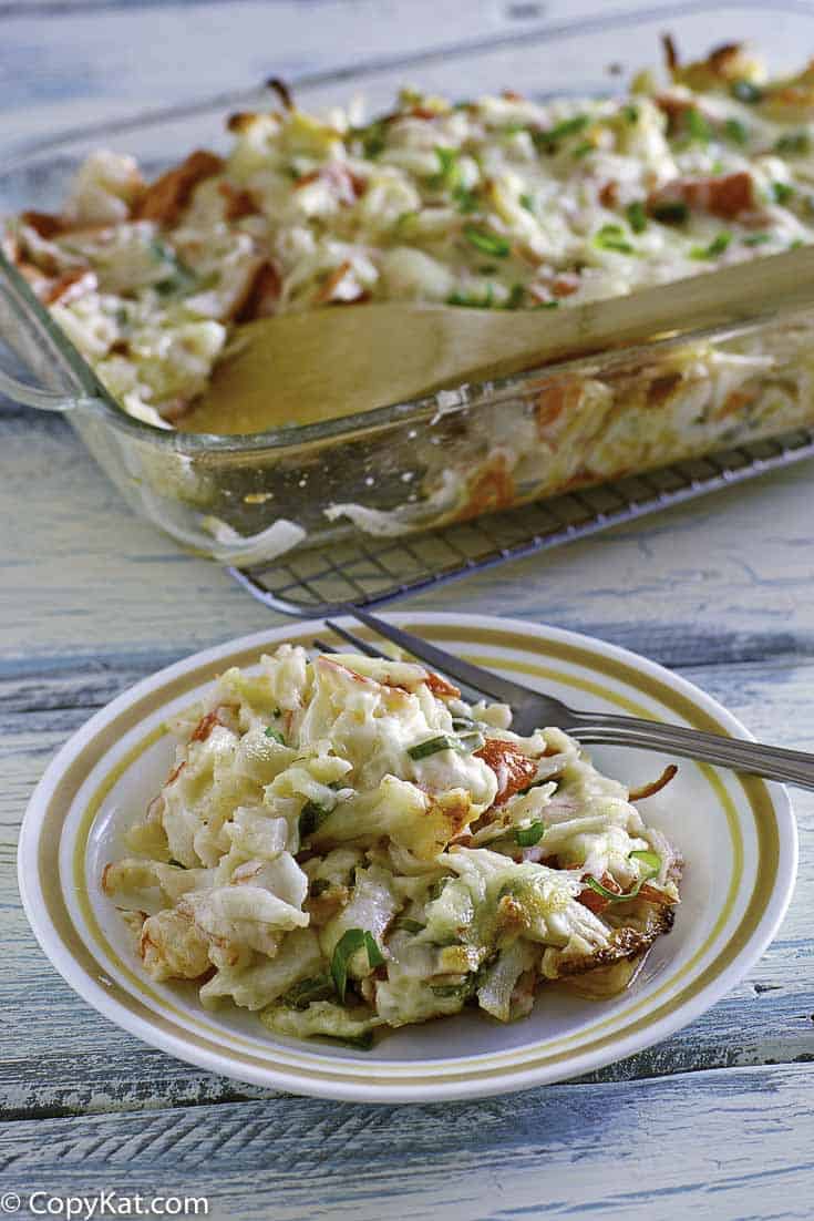 Homemade copycat Chinese Buffet Seafood Delight Bake on a plate and in a baking dish.