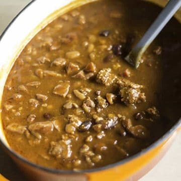 Baked Beans with Smoked Sausage in a Dutch oven