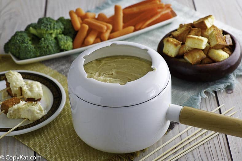 Traditional Swiss cheese fondue with assorted dippers