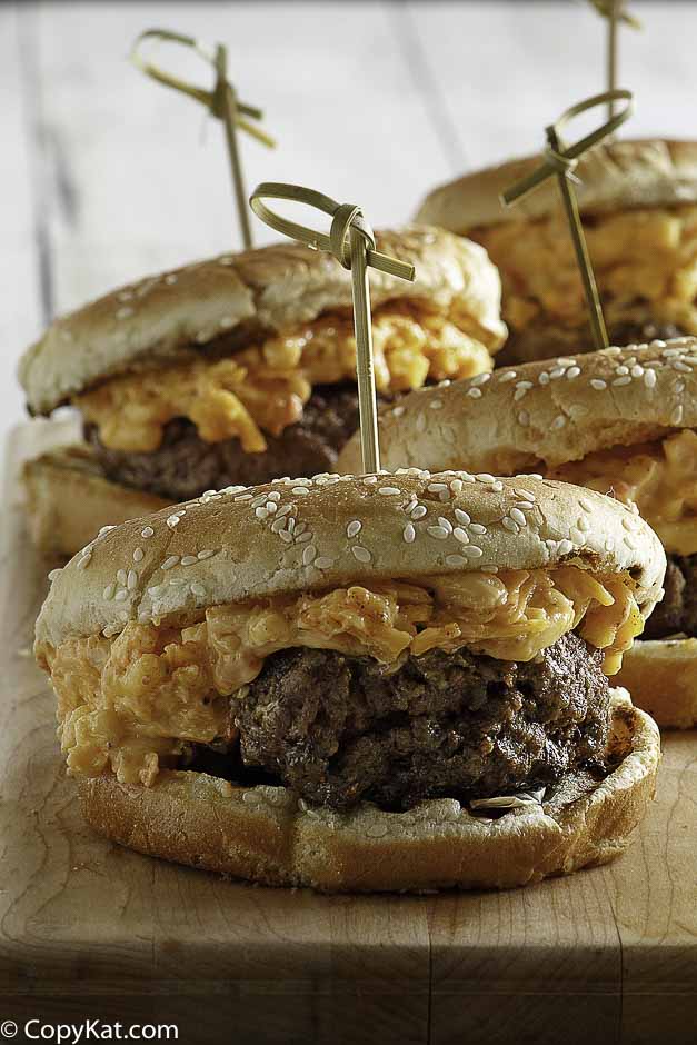 Burgers topped with pimento cheese spread.