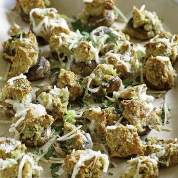 Homemade Olive Garden stuffed mushrooms in a serving dish.