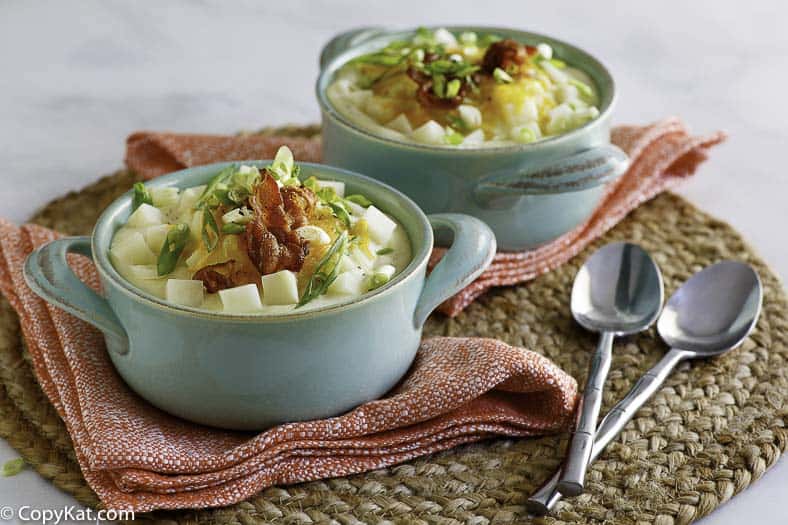 Two bowls of baked potato soup