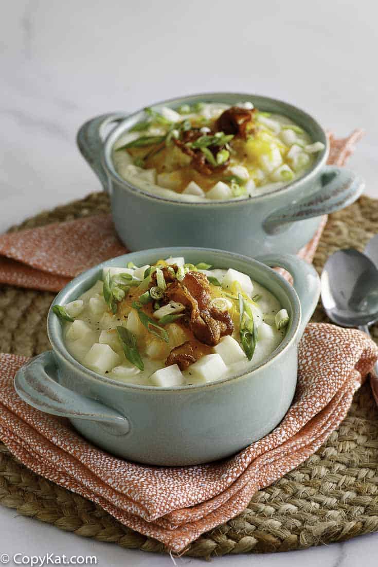 Two bowls of homemade baked potato soup recipe.