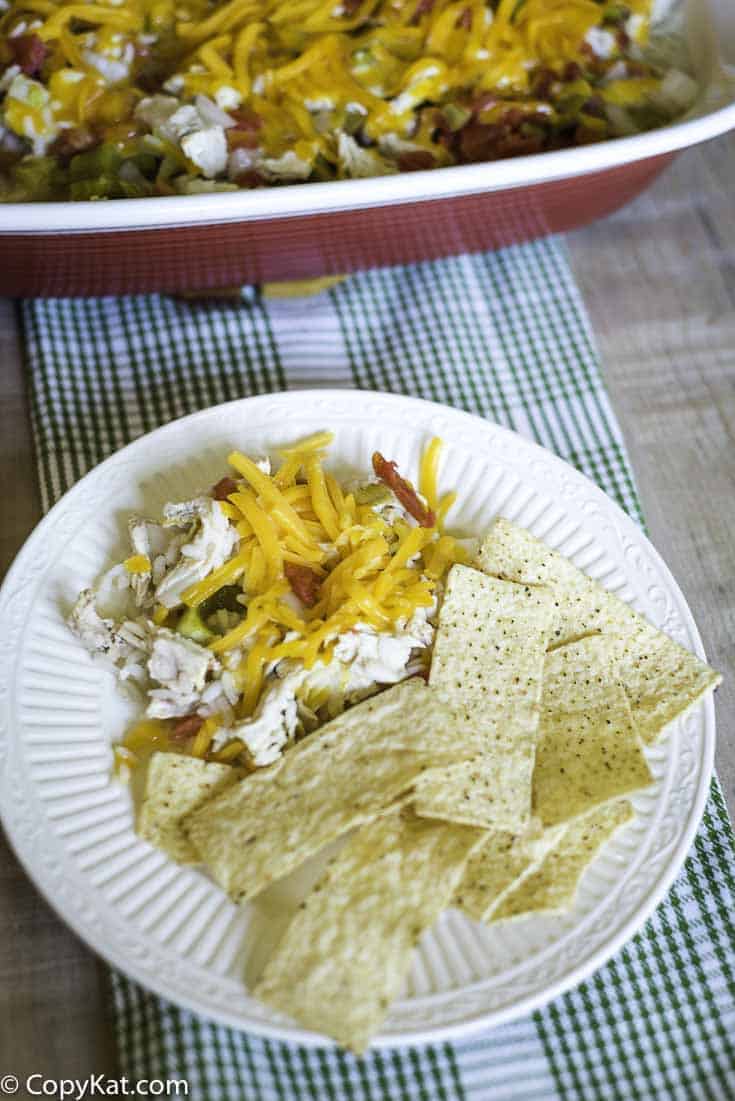 Spanish chicken and rice casserole served with corn chips.
