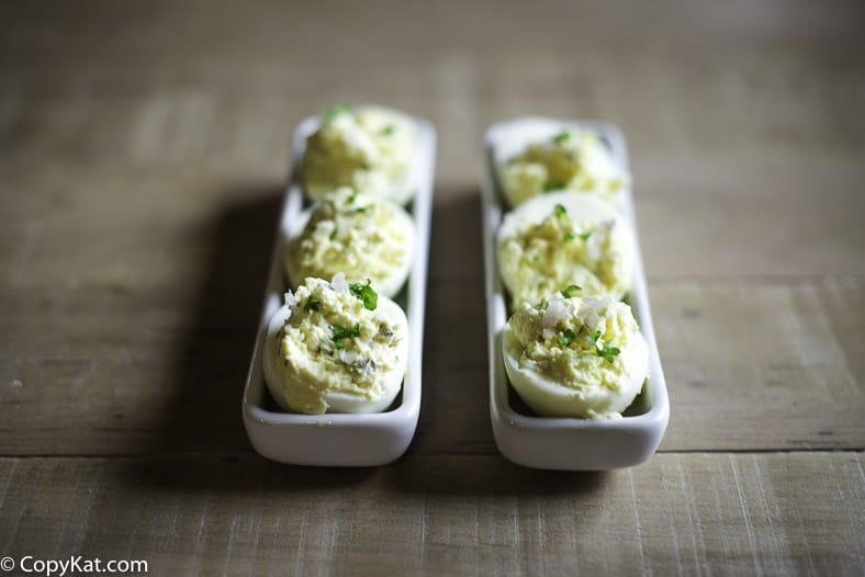 two small trays of truffle deviled eggs