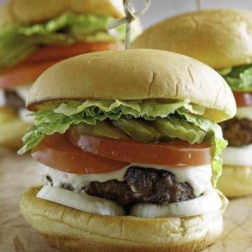 three butter hamburgers with cheese