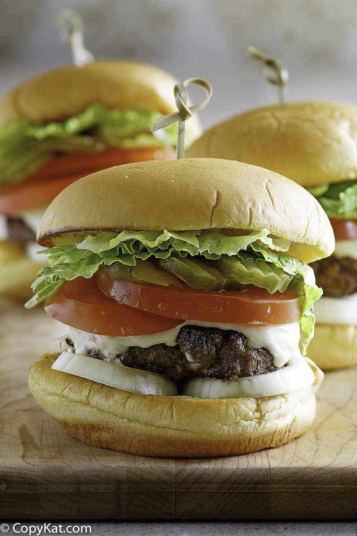 three butter hamburgers with cheese 